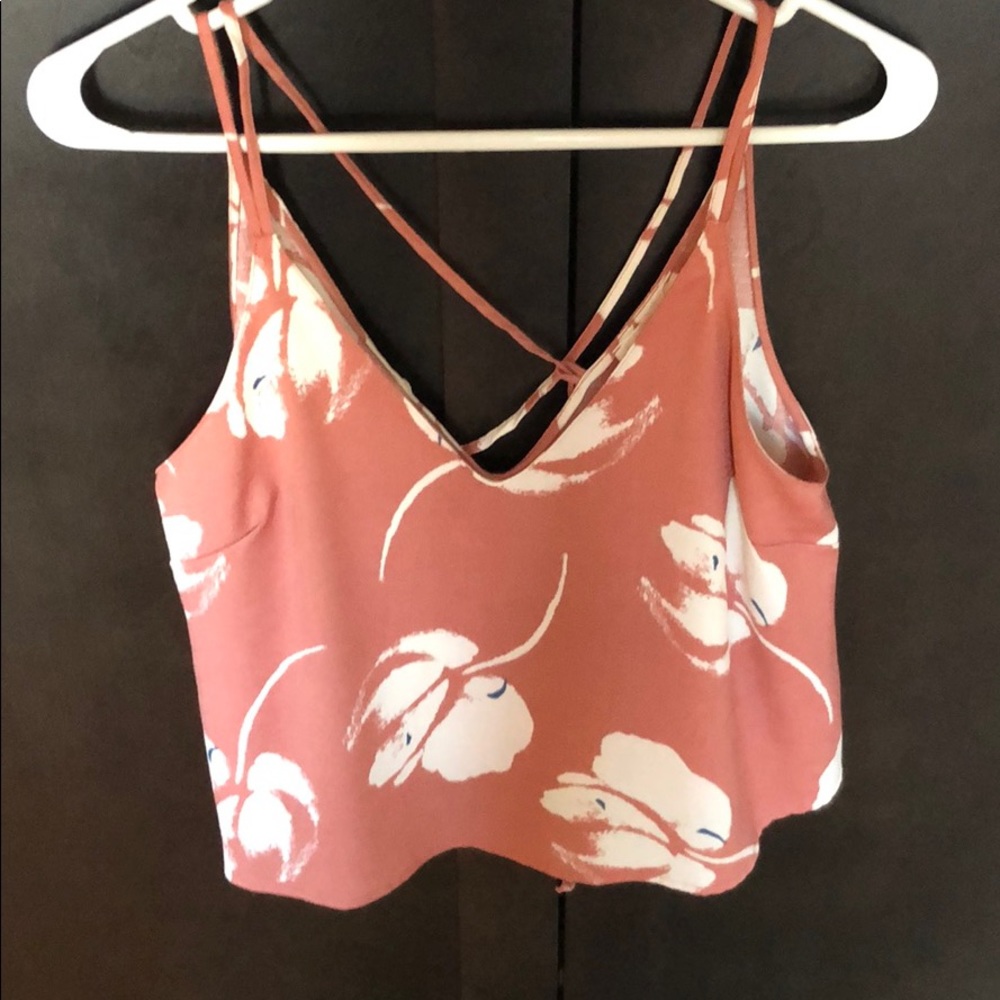 Tank top and criss cross back. With tags.